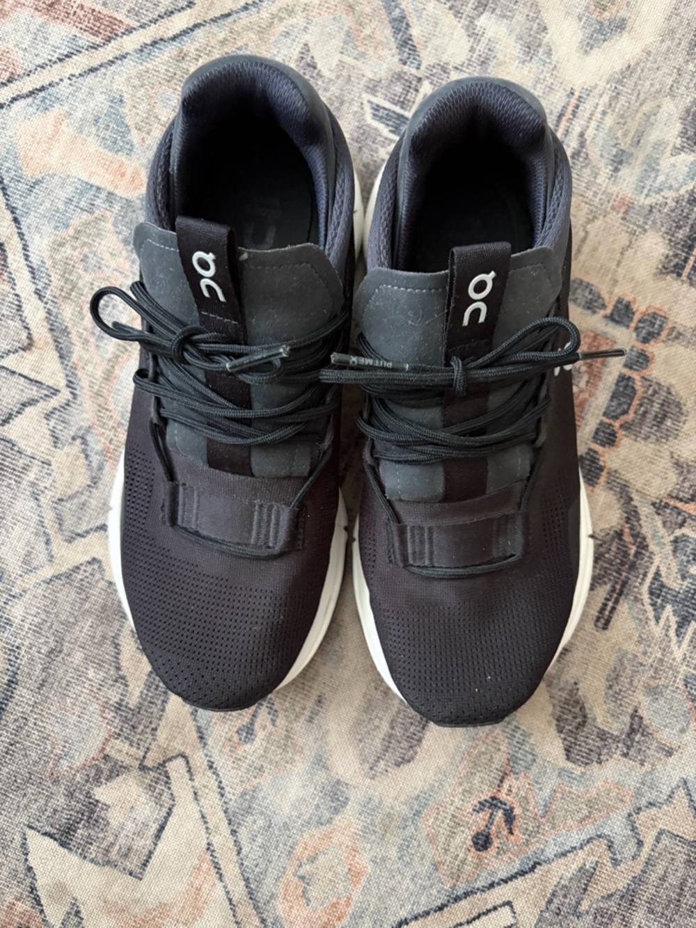 On Running womens Sneakers in Black with White Soles